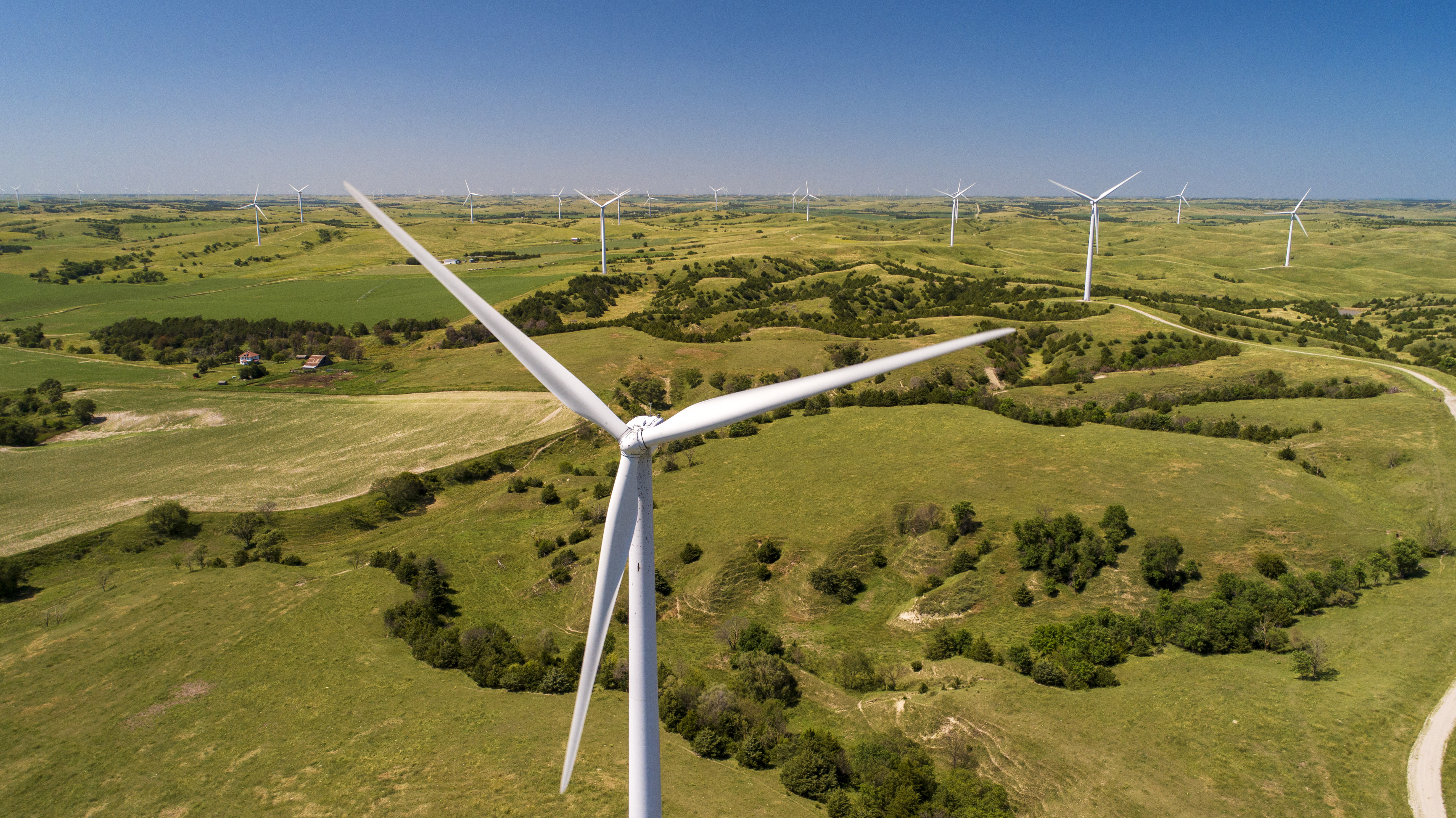 Wind turbines are seen in the Sandhills.