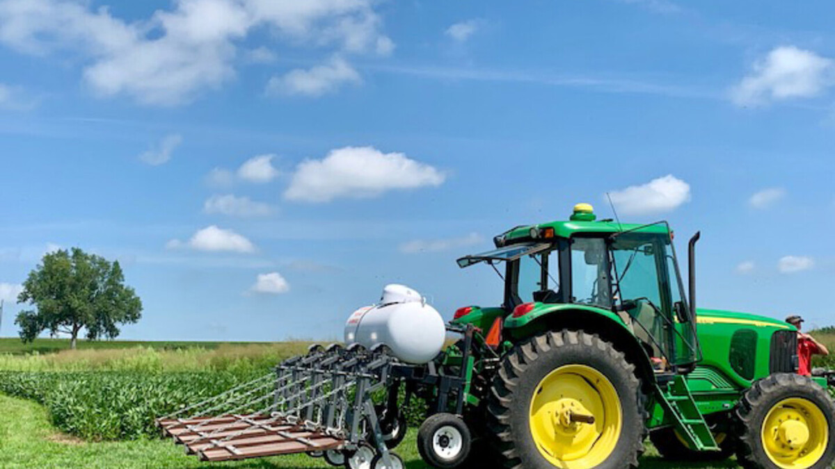 tractor in green pasture 