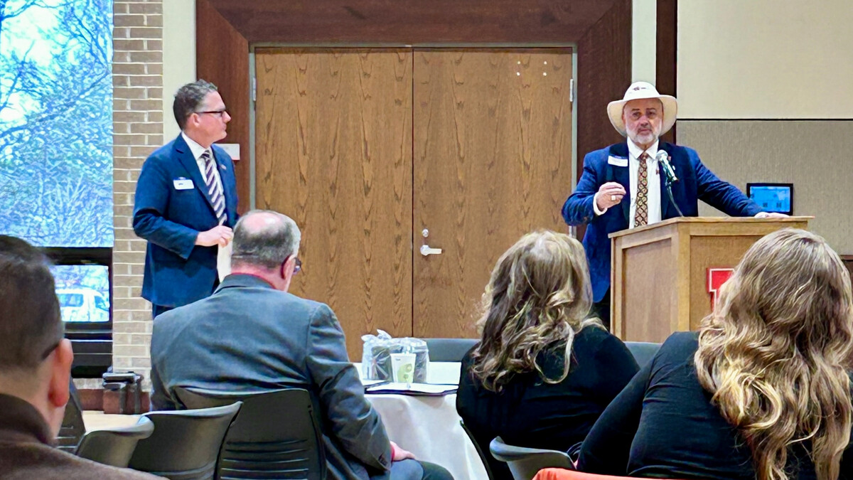 Dean of Nebraska Extension Charlie Stoltenow (right) speaks to attendees at the 2026 Water and Integrated Cropping Systems Conference on March 3 at the University of Nebraska–Lincoln East Campus Union. 