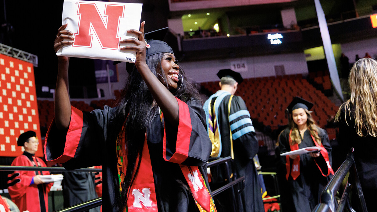 Husker Nyoka Lasu celebrates after receiving a bachelor’s degree in secondary education during commencement exercises on Dec. 21, 2024.