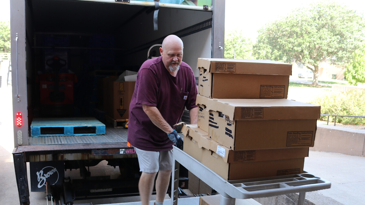 loading boxes on to trailer 