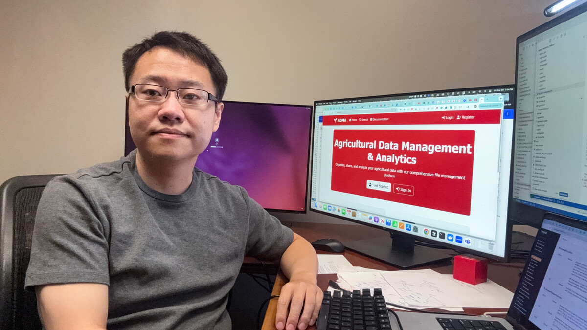 Yu Pan in his office with a computer