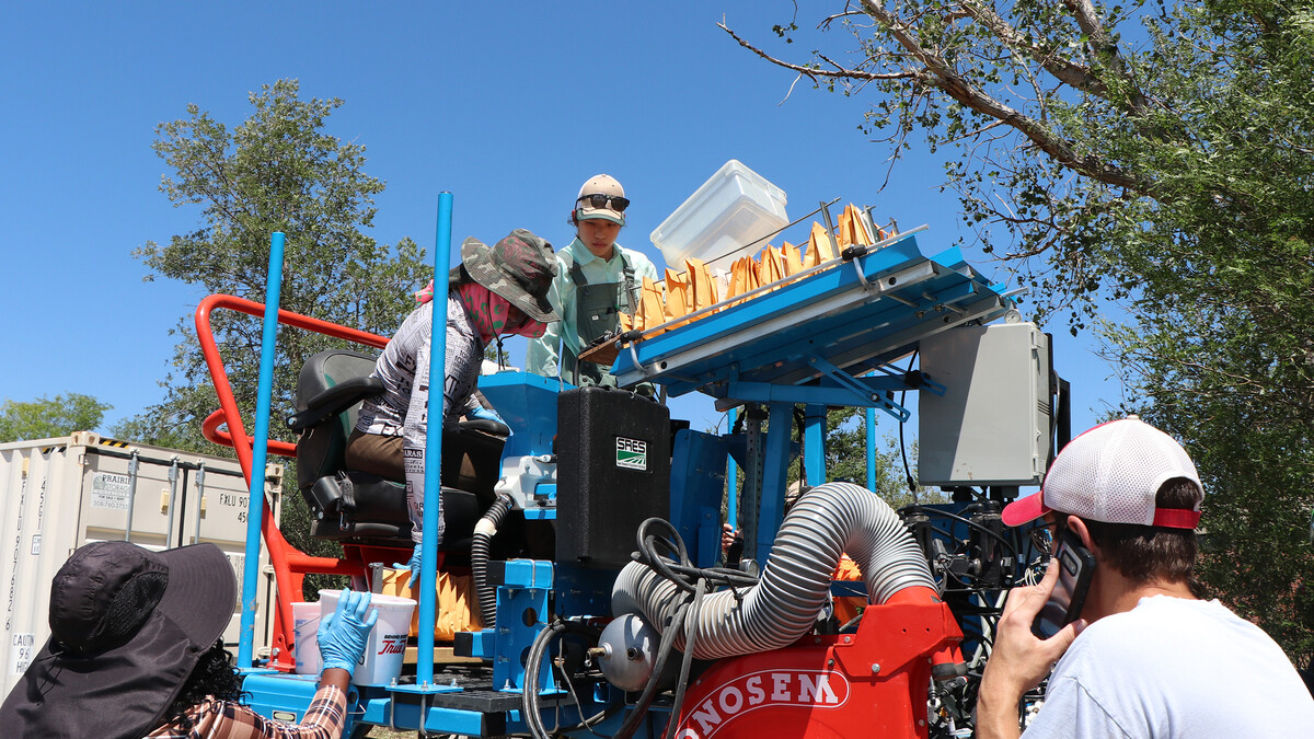 people gathered around equipment