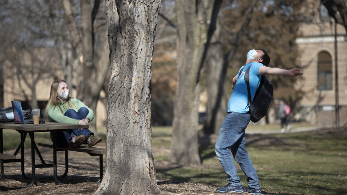 Students enjoy the warm weather on East Campus