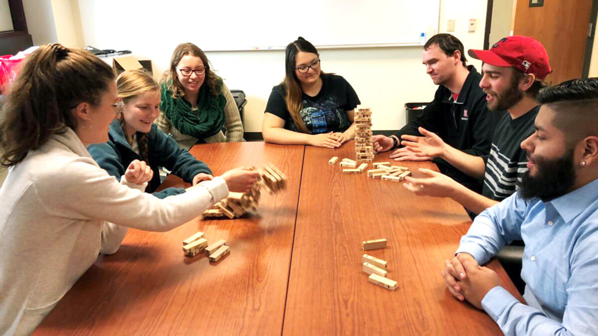 students playing jenga