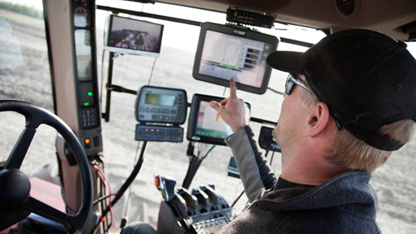 farmer in tractor cab