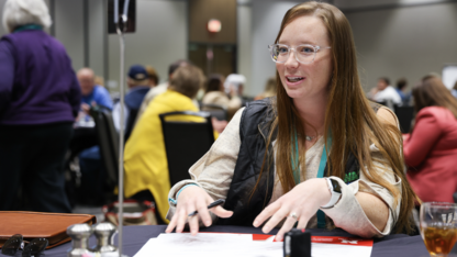 a woman participates in a leadership workshop 