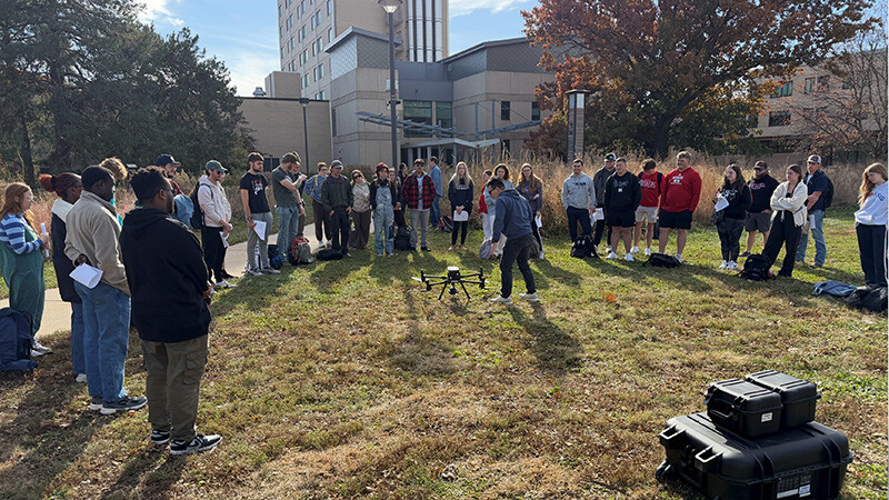 Biquan Zhao, a postdoctoral research associate in the Department of Animal Science, teaches University of Nebraska–Lincoln students about drones and their sensors.