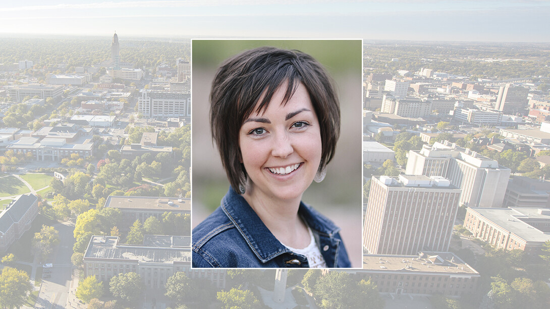 Color portrait of Shaylyn Romney Garrett — aColor portrait of Shaylyn Romney Garrett — author, speaker and social entreputhor, speaker and social entrepreneur — on a color campus background.