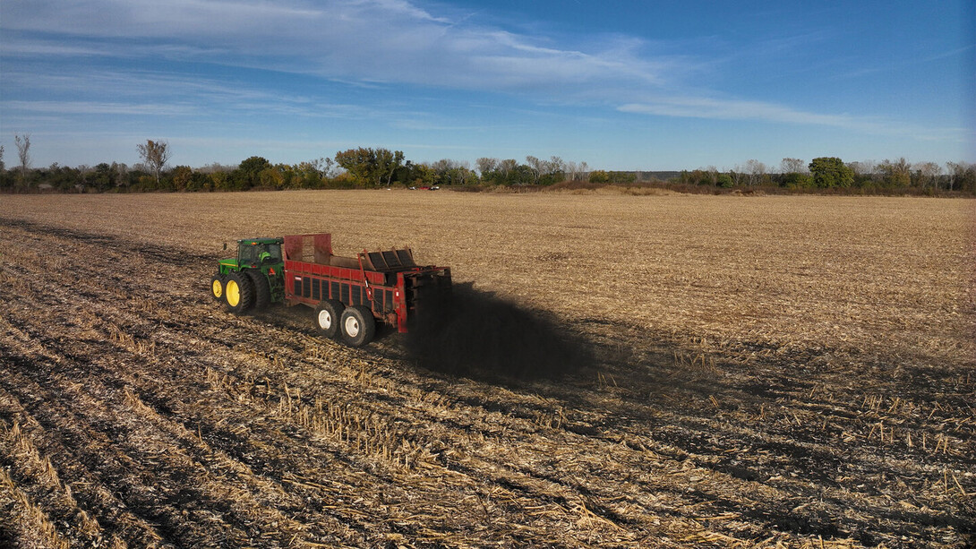 In the fall of 2025, biochar is applied to a field with corn stubble at an on-farm research network site near Plattsmouth, Nebraska. 