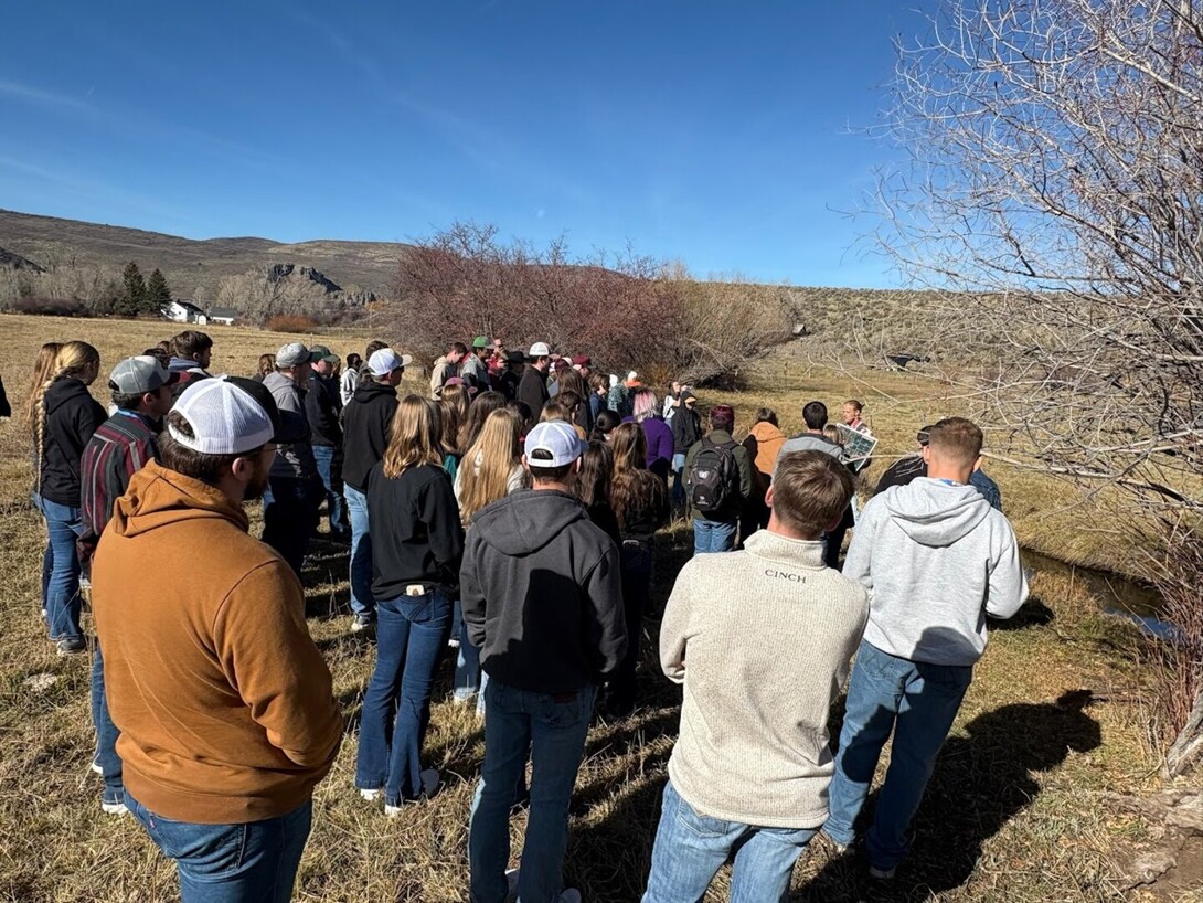 McKinley Smoot, of 3 Springs Land and Livestock near Oakley, Utah, presents to students on the importance of measuring pasture health in cattle operations during a CANVAS 2025 industry tour.