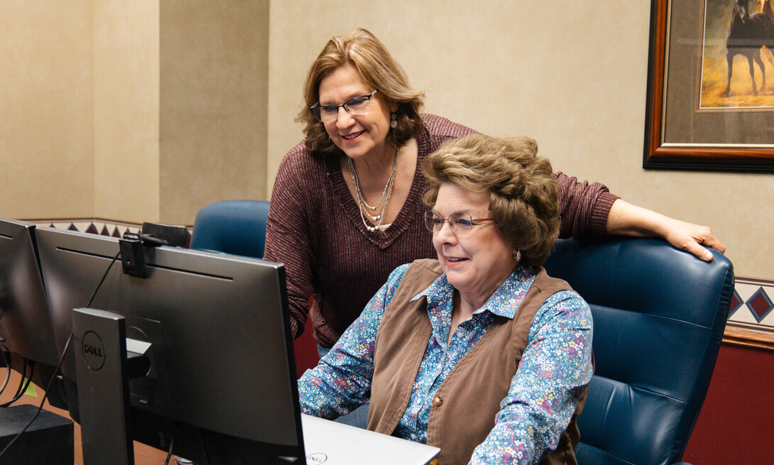 Marilyn Schlake (left) and Cheryl Burkhart-Kriesel collaborate on a content and lesson plans for the Public Participation and Engagement course.” Photo by Karlie Gerlach
