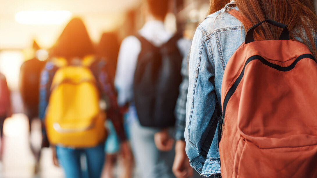 students with backpacks