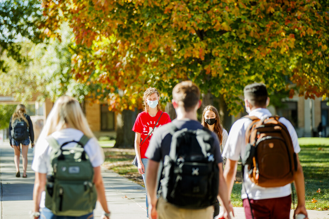 Students walk on East Campus 