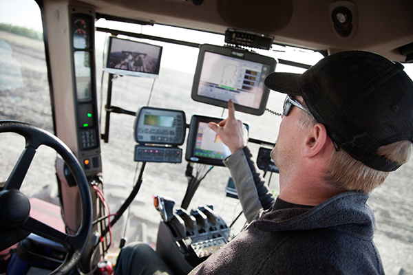 farmer in tractor cab