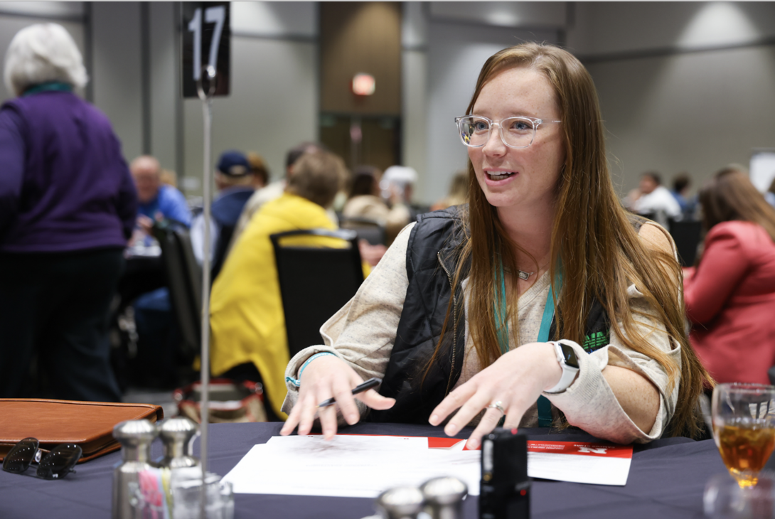 a woman participates in a leadership workshop 