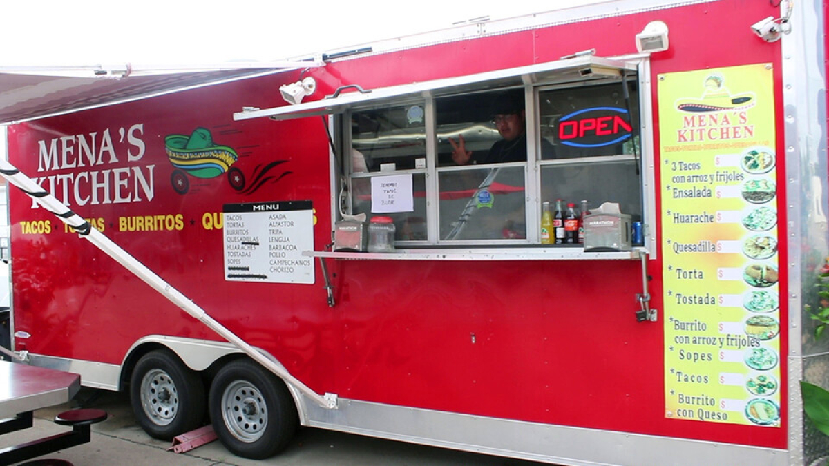 mena's kitchen food truck with open sign