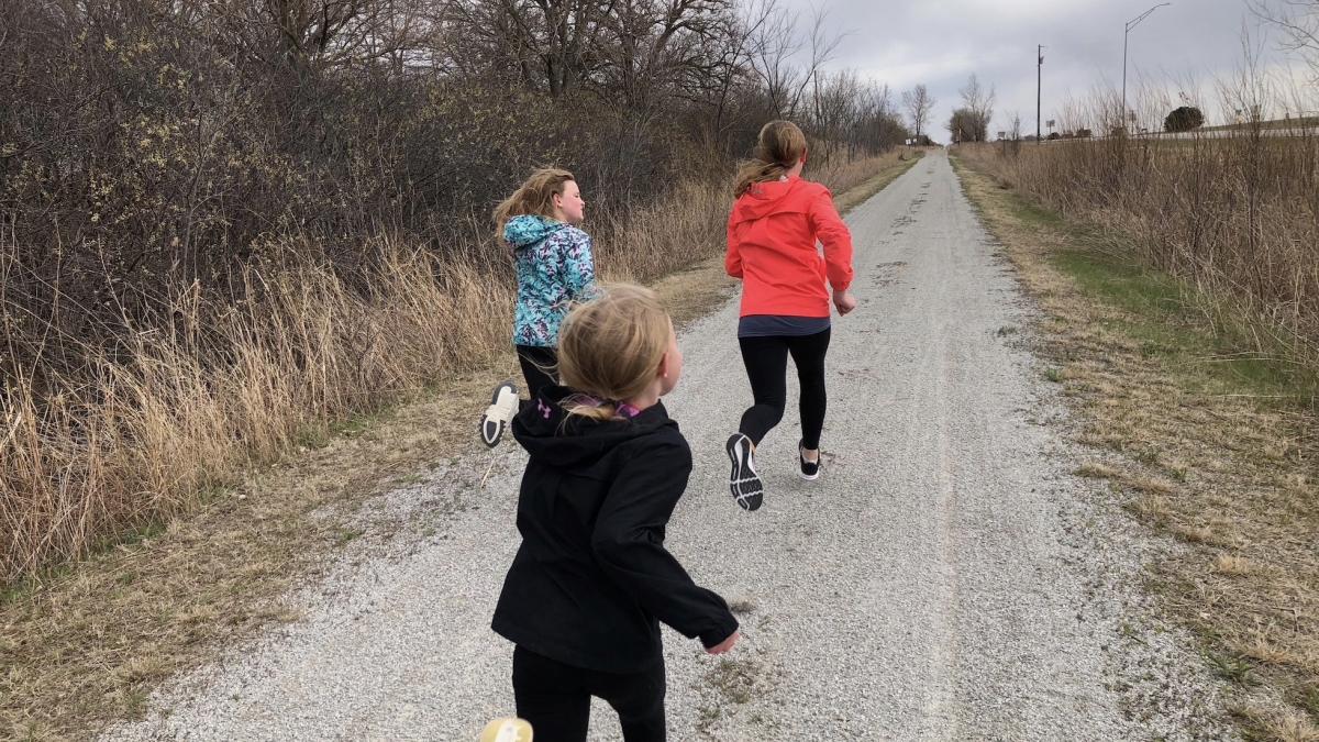 kids running on trail