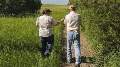 farmers walking on trail