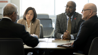 U.S. Secretary of Agriculture Tom Vilsack (from left) talks to UNO Chancellor Joanne Li, UNL Chancellor Rodney D. Bennett, and Mike Boehm, vice chancellor for UNL's Institute of Agriculture and Natural Resources, on March 28.