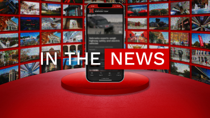 "In the News" in front of a smartphone, with multiple images of UNL campus behind.