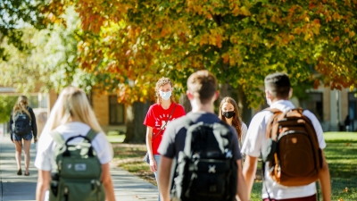 Students walk on East Campus 